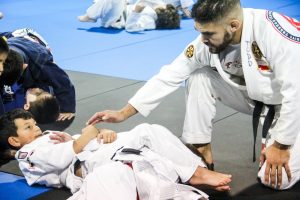 Team Tooke Instructor helping a student