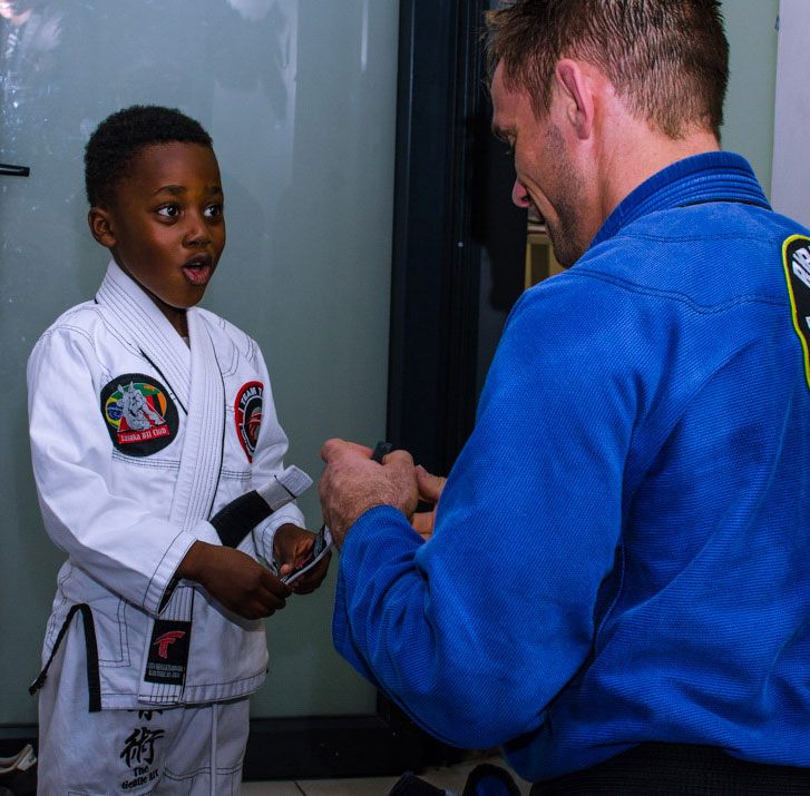 Travis Tooke teaching young student